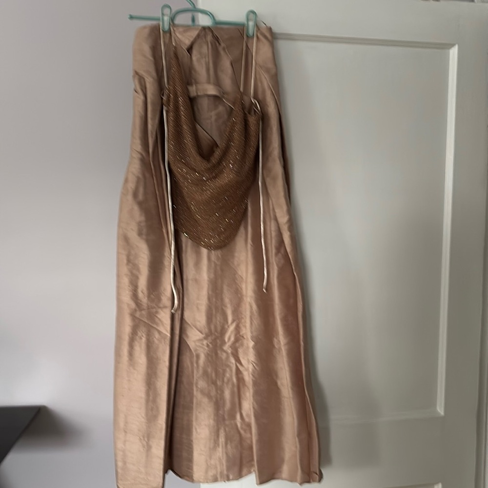 Stunning designer skirt+top. 100% silk. Never worn.